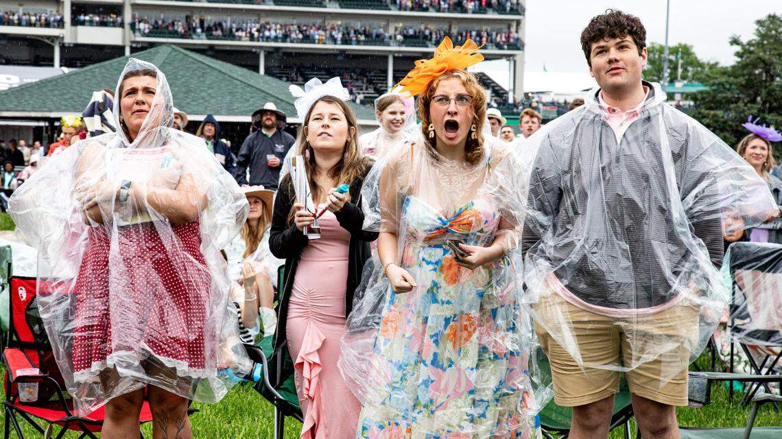 Derby-goers in the infield cheer for their horse at Churchill Downs on Derby Day 2025.