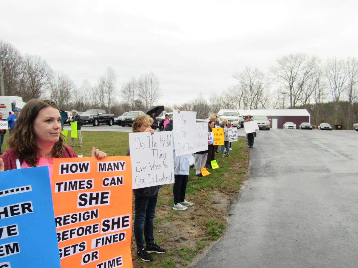 Citizens protested in McCreary County, Kentucky on Feb. 28, 2019 urging the school board to fire an administrator and teacher they alleged had engaged in improper conduct.