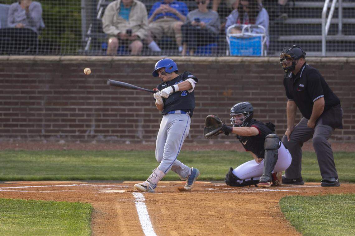 Lexington Christian Academy's Tyler King hits the ball during a game at Paul Laurence Dunbar High School in Lexington, Ky., on Tuesday, April 21, 2026.