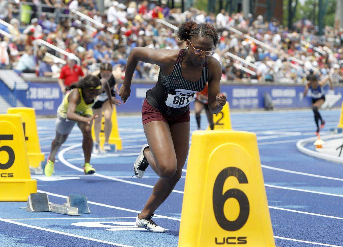 Tates Creek runner Nakaiya Wearren came out of the block at the start of the 400-meter dash during the 2018 KHSAA Class 3A State Track & Field Championships on Saturday.