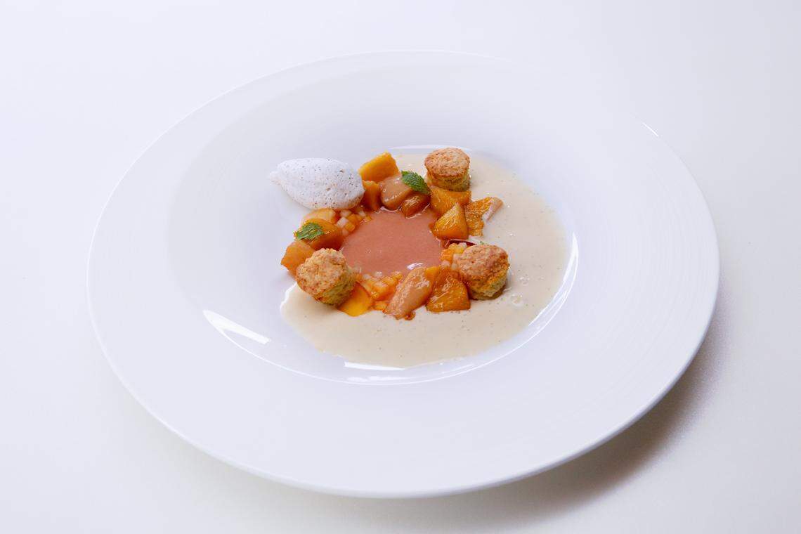 Kelsey’s final course: Deconstructed peach cobbler, with fancy dabs of cream. The judges weren’t all sure about the honeysuckle ice cream or szechuan peppercorn whipped cream.