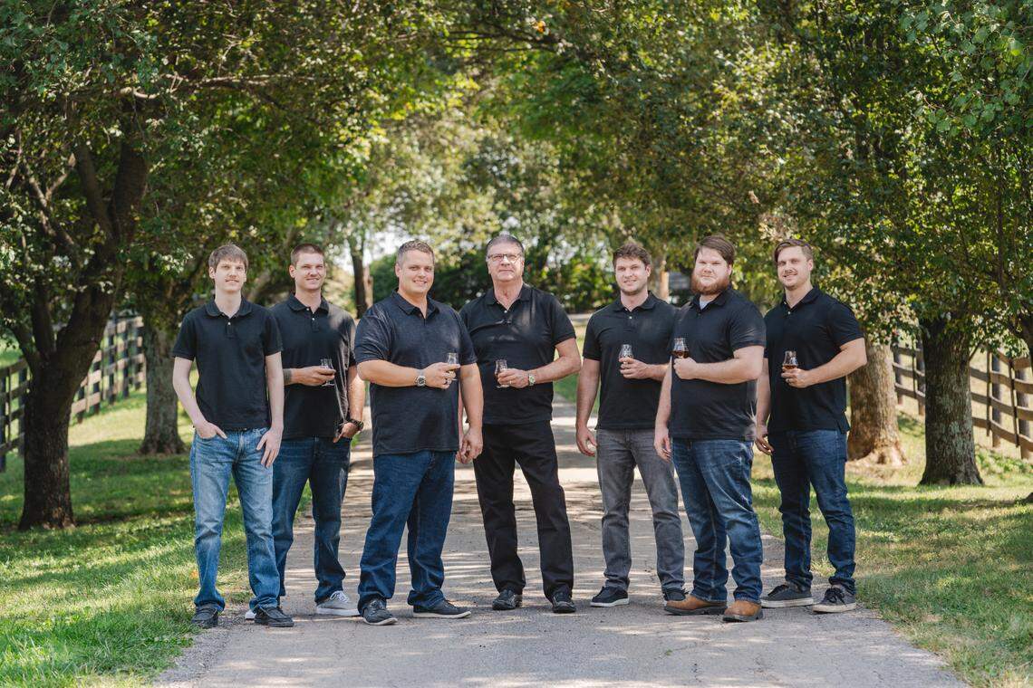 Wes Henderson, center, has started a new bourbon, True Story, as a legacy project for his six sons, all of whom either are involved in the new Kentucky Castle-based brand or will be.
