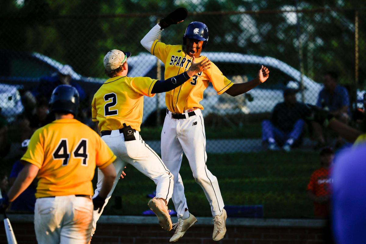 Sayre’s Brock Coffman (3) celebrates after scoring against Henry Clay in the 42nd District Tournament championship game. Sayre won 3-2.