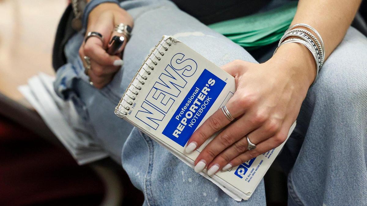 Kentucky Kernel Editor-in-Chief Abbey Cutrer holds a reporters notebook during a staff meeting, Monday, March 10, 2025 in the offices of the independent student newspaper of the University of Kentucky in Lexington, Ky.