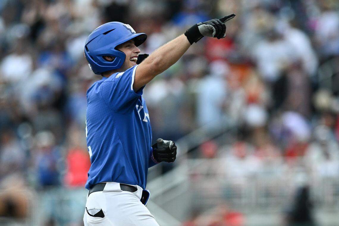 Jun 15, 2024; Omaha, NE, USA;  Kentucky Wildcats third baseman Mitchell Daly (2) celebrates hitting a walk off home run against the NC State Wolfpack during the tenth inning at Charles Schwab Filed Omaha. Mandatory Credit: Steven Branscombe-USA TODAY Sports