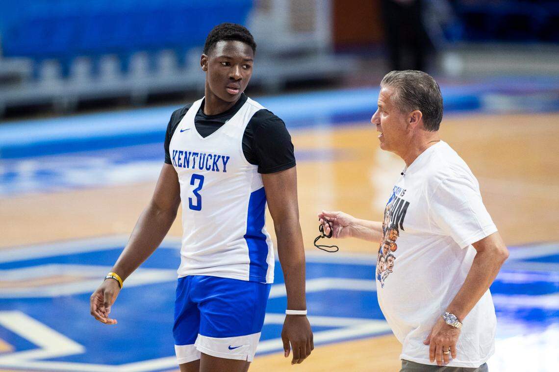 Adou Thiero listens to head coach John Calipari during a team scrimmage before his freshman season at Kentucky.