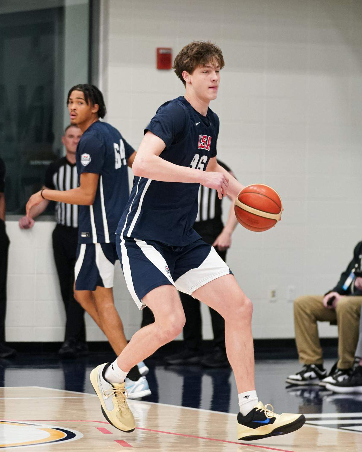 Mason Grivna, a class of 2029 center from Louisville, makes a move with the ball during a USA Basketball junior national team minicamp in April 2026 in Westfield, Indiana.