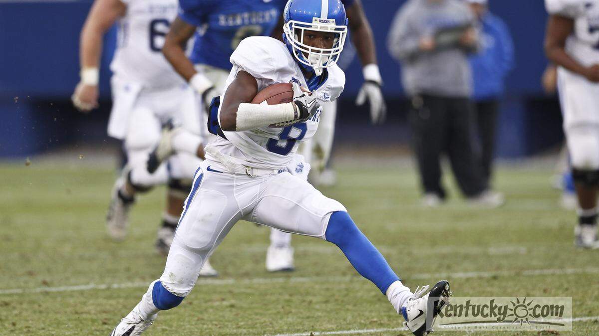 Reciever Demarco Robinson, cut upfield after a reception during the Blue-White scrimmage  on Saturday  April 21, 2012 in Lexington, Ky. Photo by Mark Cornelison | Staff
