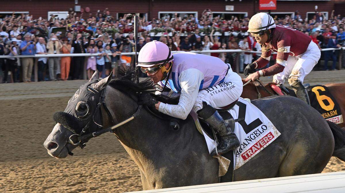 Arcangelo (2), with Javier Castellano aboard, wins the Travers Stakes at Saratoga Race Course in Saratoga Springs, N.Y., on Saturday.