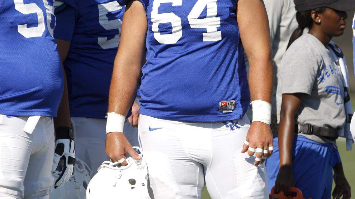 Kentucky junior center Max Godby (64) waited for his next dril in August of last year. He had been told he earned a scholarship a day earlier