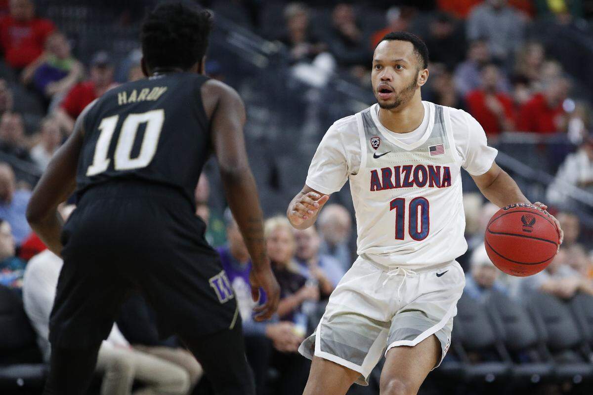 Former Kentucky guard Jemarl Baker, right, averaged 5.7 points and 2.3 assists for Arizona this season.
