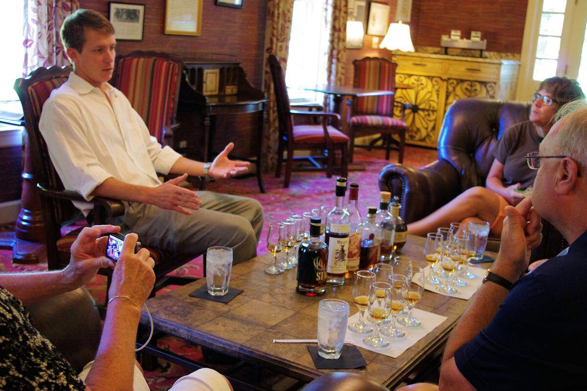 Dixon Dedman, left, co-owner and general manager of Beaumont Inn in Harrodsburg, conducted bourbon tastings in 2013.