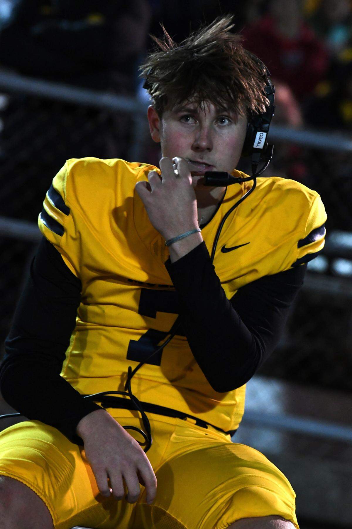 Moeller quarterback Matt Ponatoski, recently named Ohio Mr. Football and Gatorade Football Player of the Year, can often be seen wearing a headset as he is in the regional semifinal game with Princeton Nov. 15, 2024.