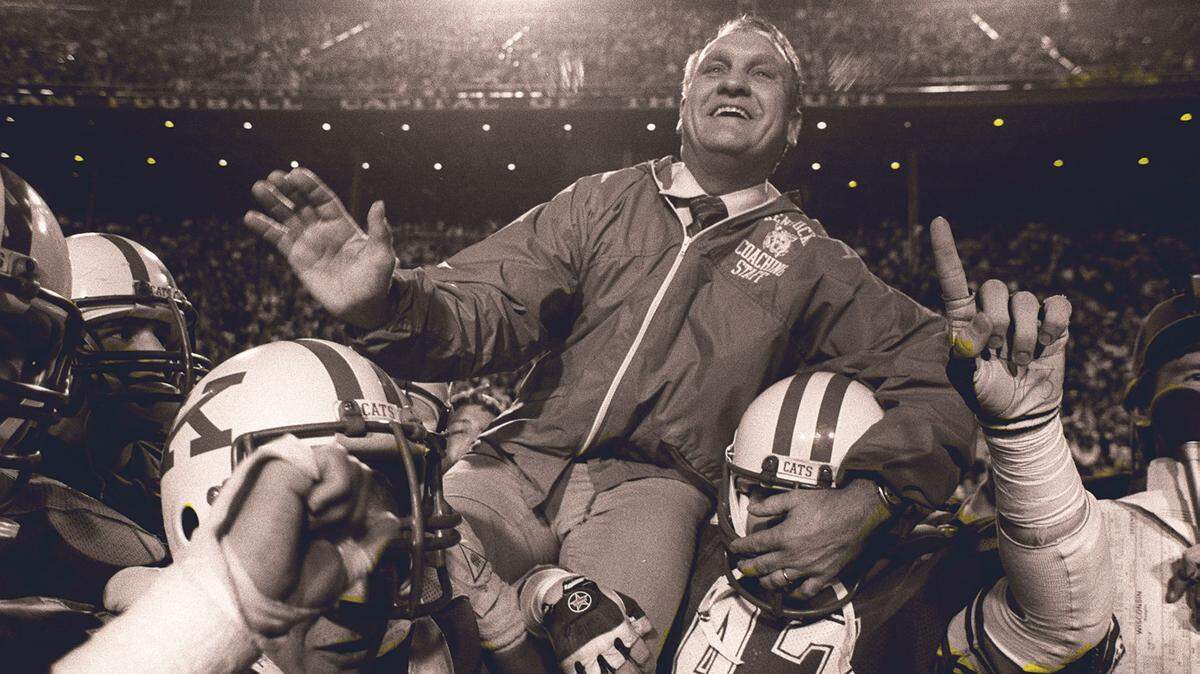 Kentucky football coach Jerry Claiborne was carried off the field after his team defeated Wisconsin 20-19 in the Hall of Fame Bowl in Birmingham, Ala., on Dec. 29, 1984.