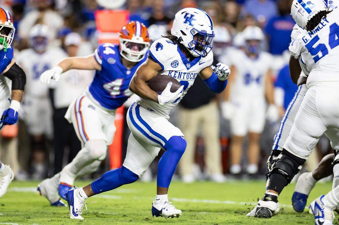 Oct 19, 2024; Gainesville, Florida, USA; Kentucky Wildcats running back Demie Sumo-Karngbaye (0) rushes with the ball against the Florida Gators during the first half at Ben Hill Griffin Stadium. Mandatory Credit: Matt Pendleton-Imagn Images