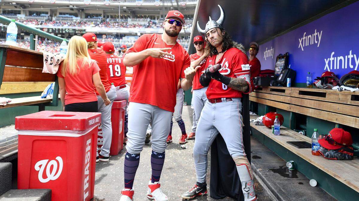 Cincinnati second baseman Jonathan India (6) poses with starting pitcher Graham Ashcraft (51) after hitting a solo home run against the Washington Nationals on Tuesday night. The Reds might need to acquire more pitching to make a postseason run if their young starters cannot overcome a rash of injuries.