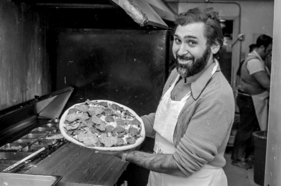 Joe Bologna in 1979 with one of his famous pizzas. Bologna started his restaurant in March 1973 in the former Columbia’s Plantation building at the corner of Maxwell and South Limestone, serving pizzas only after 3 p.m. at first. But pizza caught on and within a few years he’d expanded to three Lexington locations.