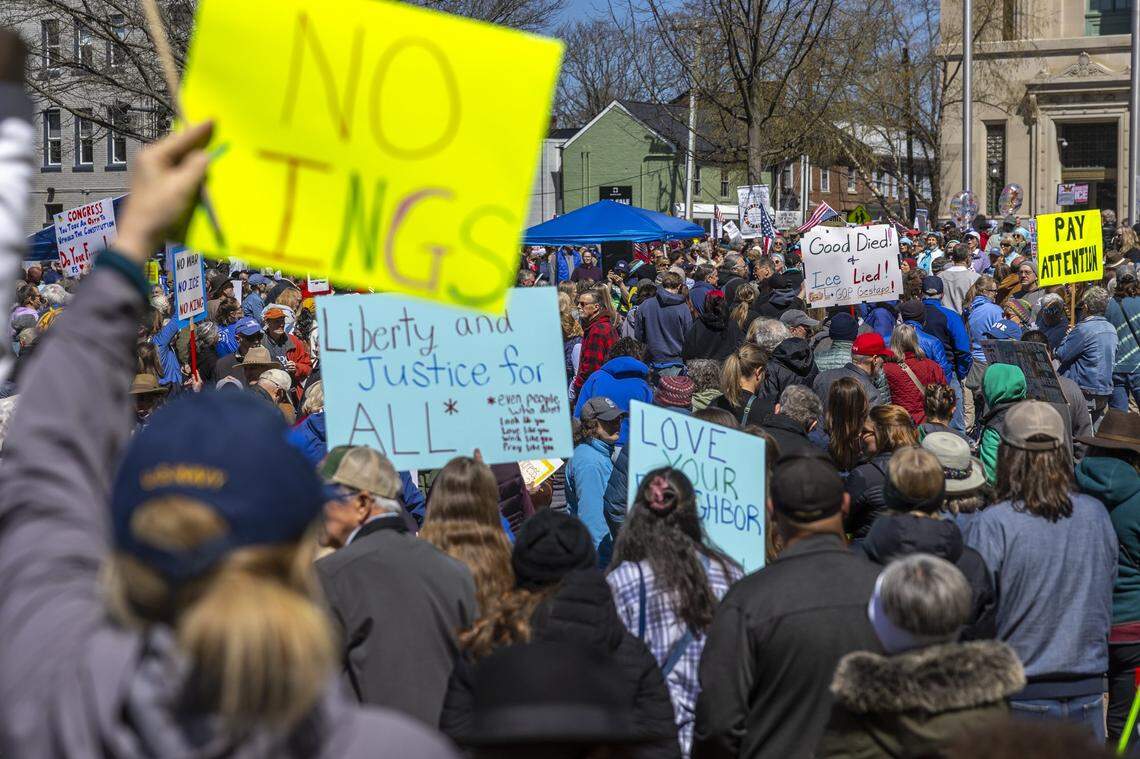 People attend a rally during a No Kings protest in downtown Lexington, Ky., on Saturday, March 28, 2026. 