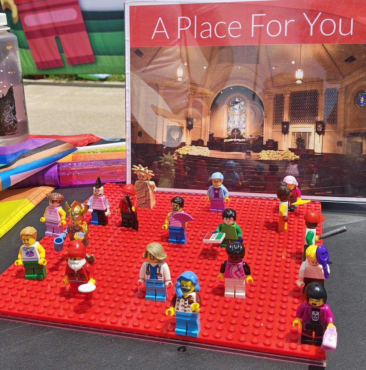 Central Christian Church’s booth at the 2026 Lexington Pride Festival included a Lego figure building activity.