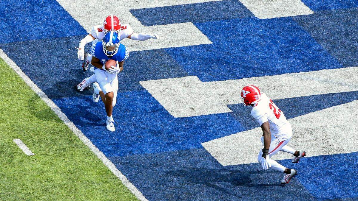 Kentucky wide receiver Dane Key catches a second-quarter touchdown on Saturday. The freshman from Frederick Douglass High School in Lexington has a TD reception in every game this season.