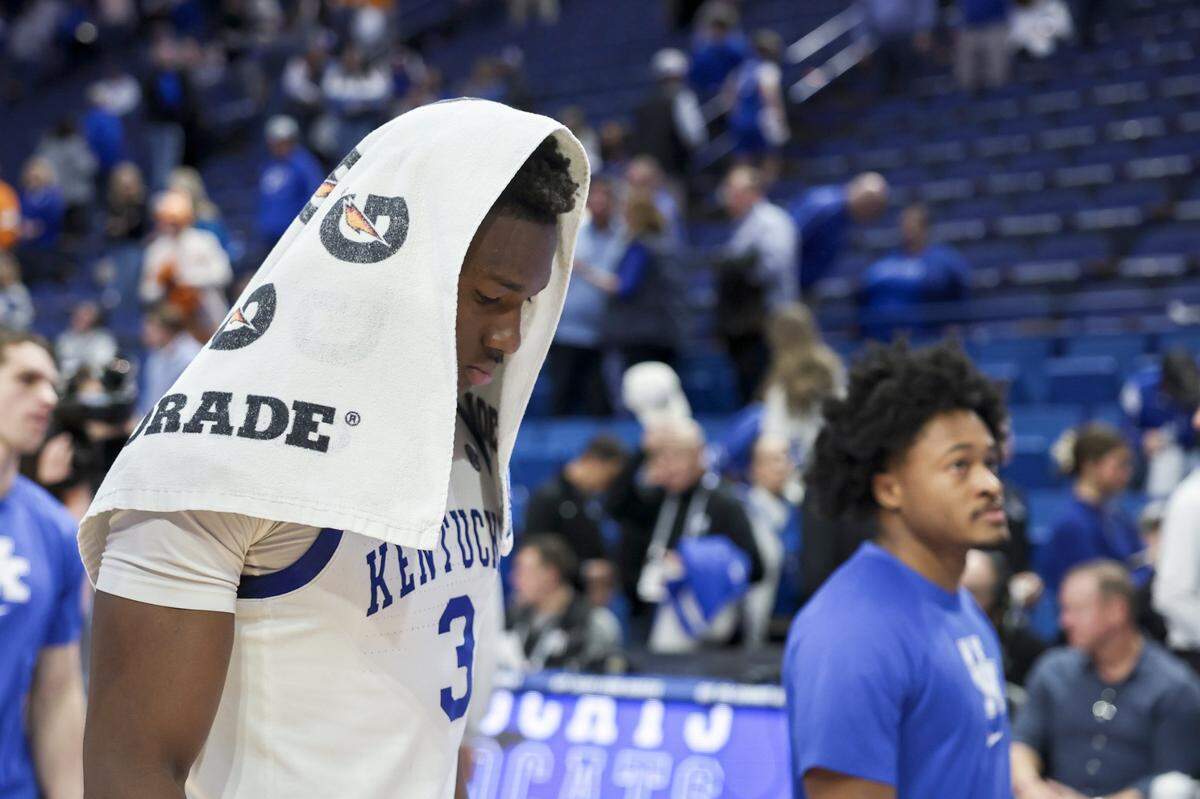 Adou Thiero walks off the Rupp Arena court with his Kentucky teammates after Saturday’s 103-92 loss to Tennessee, the second straight home defeat for the Wildcats.