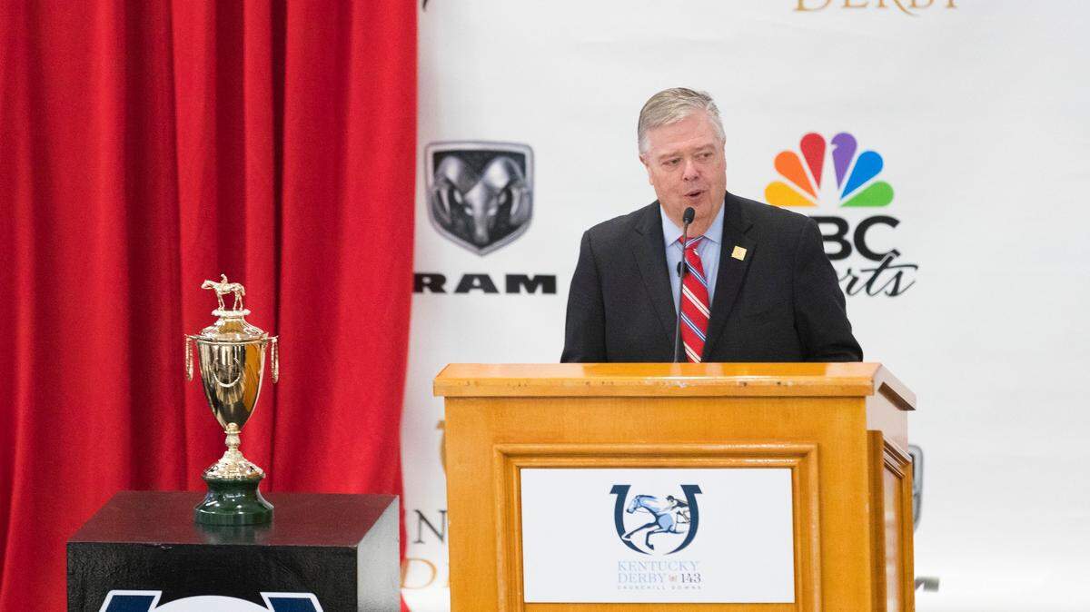 John Asher, vice president of racing communications for Churchill Downs, spoke at the 2017 Kentucky Derby Post Draw at Churchill Downs. Asher, 62, died Monday morning of an apparent heart attack.