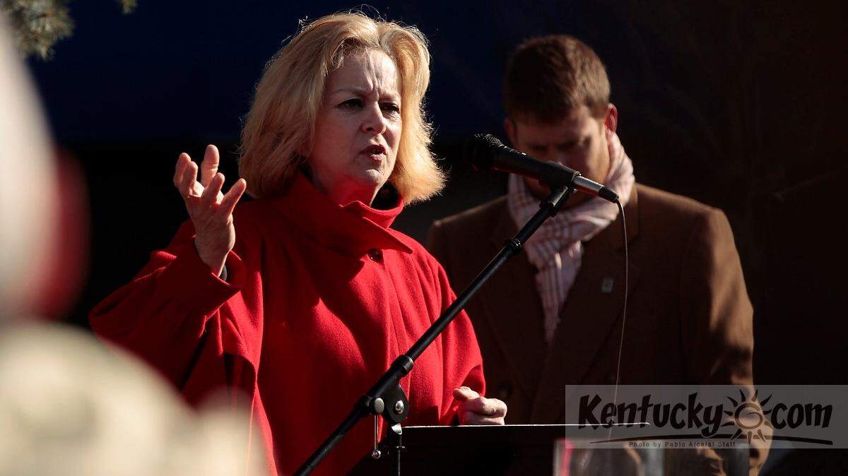 Sen. Kathy Stein, D-Lexington, spoke after clergy during a vigil for victims of the Sandy Hook shooting at Triangle Park in Lexington, Ky., on Jan. 5, 2013. About 150 people attended the vigil while the Lexington Gun and Knife Show was taking place at the Lexington Center nearby. Photo by Pablo Alcala | Staff