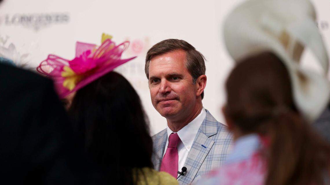 Gov. Andy Beshear speaks to media at the Kentucky Derby Red Carpet on Saturday, May 3, 2025, at Churchill Downs in Louisville, Kentucky.