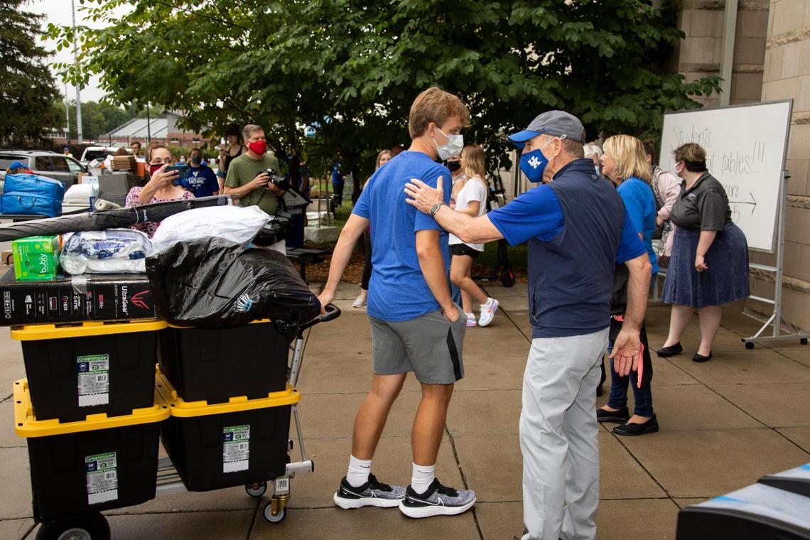 University of Kentucky President Eli Capilouto welcomes students as they move belonging into Woodland Glen III residence hall at the University of Kentucky in Lexington, Ky., Monday, August 16, 2021.