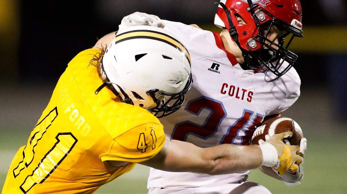 Woodford County’s Jackson Geilear (41) tackled West Jessamine’s Haden Rowland (24) during their playoff game last year. Geilear is among this week’s nominees for Kentucky.com Defensive Player of the Week.