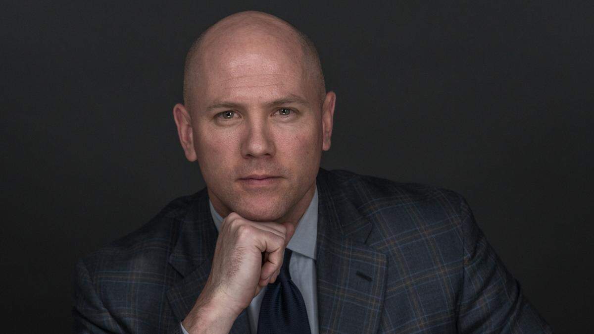 Jeff Sheppard in his “day uniform” as a financial adviser for Family Wealth Group.