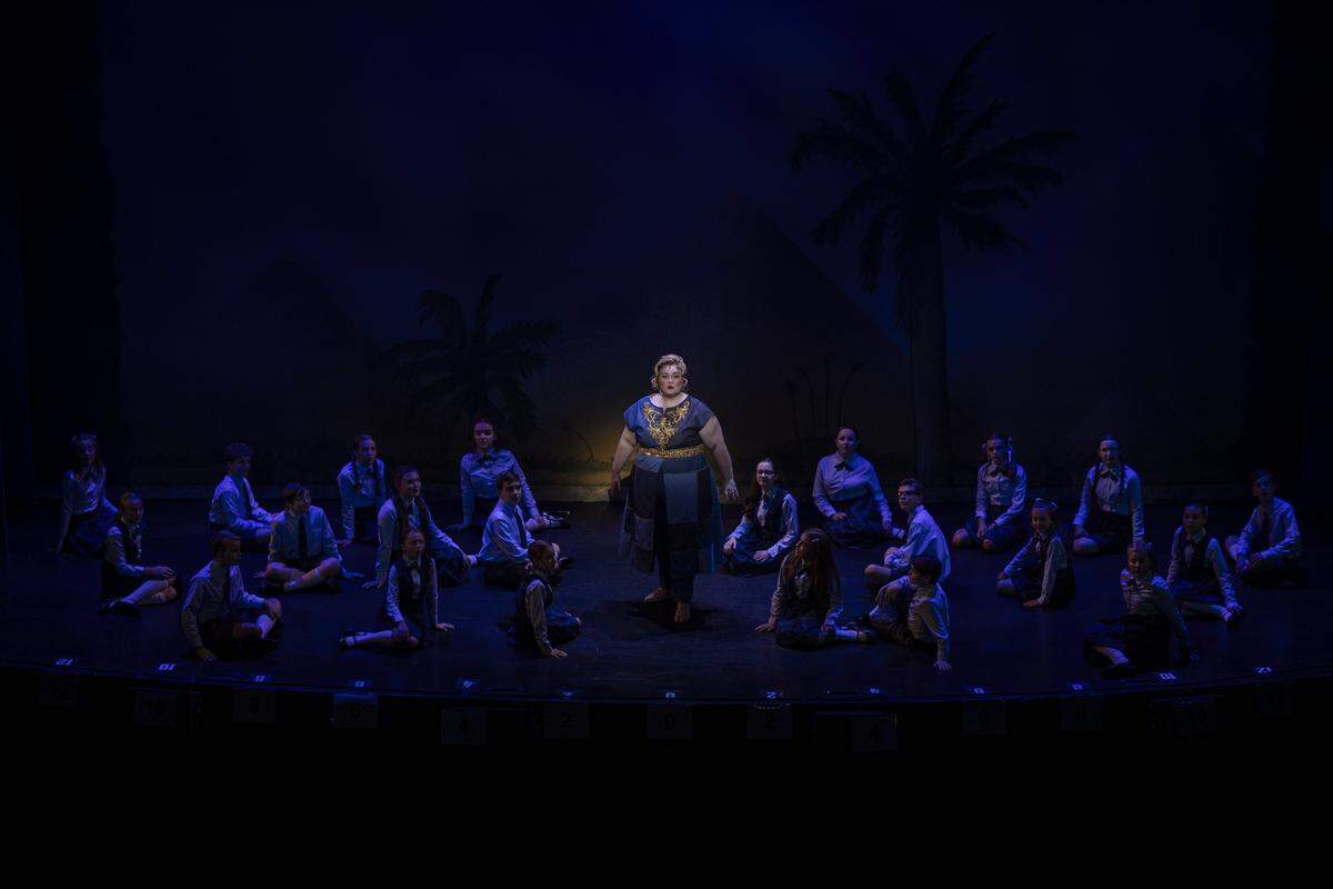 Audrey Belle Adams, center, sings during a rehearsal of Joseph and The Amazing Technicolor Dreamcoat Monday, July 28, 2025, at the Lexington Opera House in Lexington, Ky.