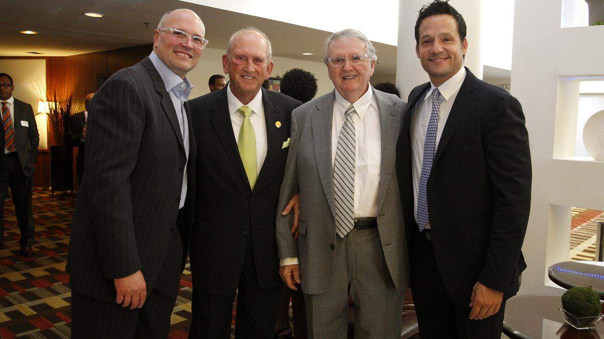 Former UK basketball star Rex Chapman, Ralph Hacker, former U.S. Rep. Larry Hopkins and his son actor Josh Hopkins during a reception prior to the induction ceremony for the UK Athletics Hall of Fame at the Hyatt Regency in Lexington, Ky., Friday, September 27, 2013. Photo by Matt Goins