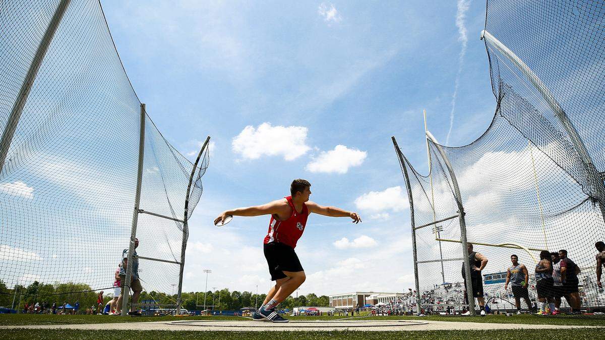 Scott County's Bryan Hudson competed in the boys' discus during the Class 3A, 6th Region track meet Saturday at Henry Clay High School.