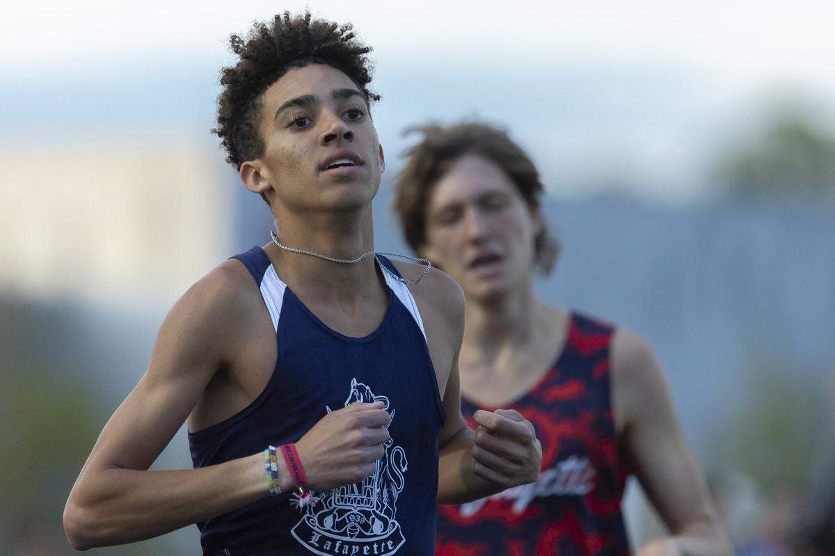 Lafayette's Zavier Richardson, left, competes during the Region 6 track and field meet at George Rogers Clark High School in Winchester, Ky., on Friday, May 8, 2026.
