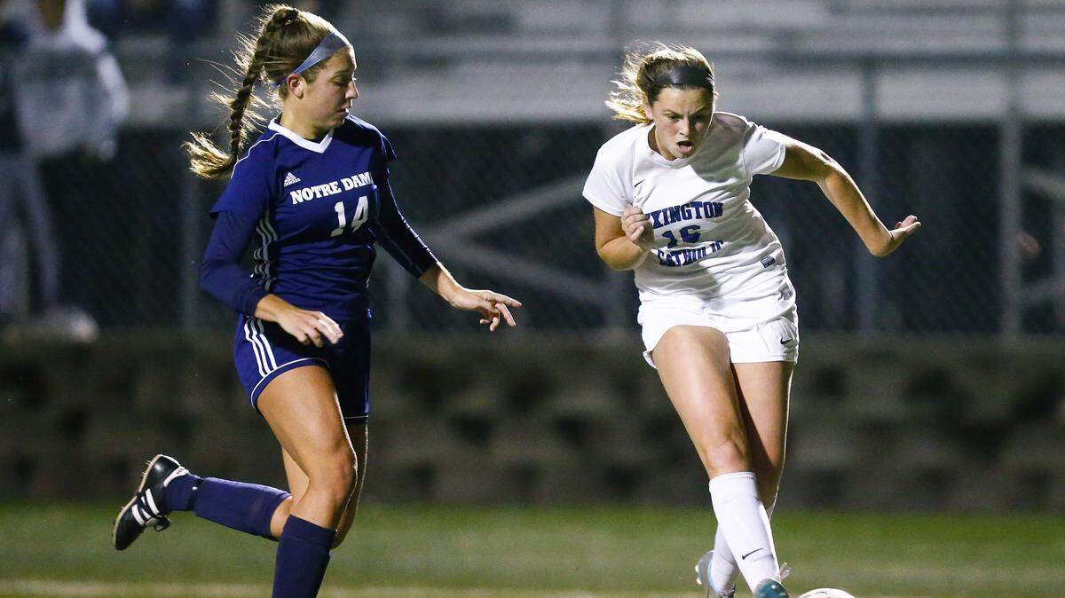 Lexington Catholic’s Kennedy Tranter, right, who helped take the Knights to two state finals during her career, has decided to not continue her playing career at Kentucky. She graduated high school early to join the Cats in the spring, but left training citing family concerns. She continues to be a UK student.