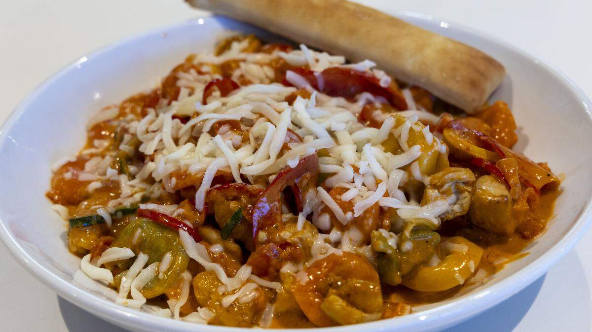 The Creamy Chipotle Tortellini with chicken ($16.75) at Nothing But Noodles is made with tri-color tortellini pasta filled with an Italian three-cheese blend and tossed in a creamy chipotle sauce with zucchini, and yellow squash, red bell pepper and diced tomatoes. 