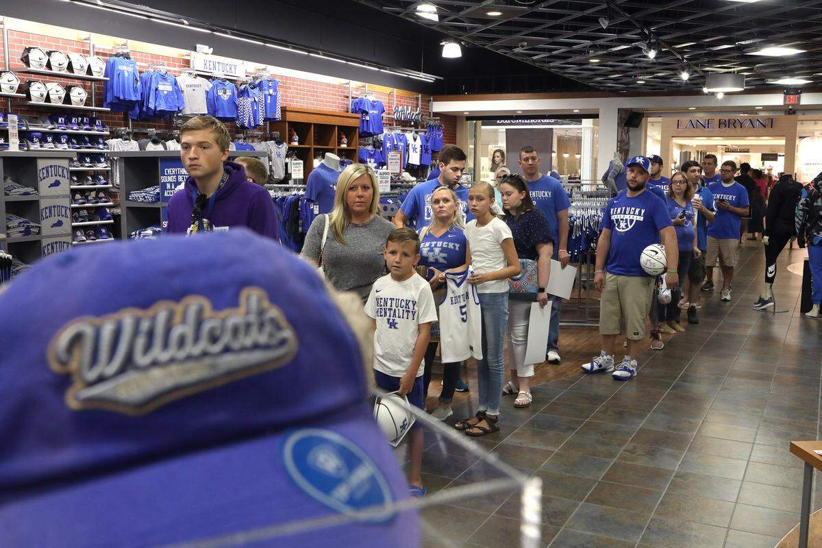 Fans waited to meet former UK player Jarred Vanderbilt on Tuesday during an autograph session at Allsports.