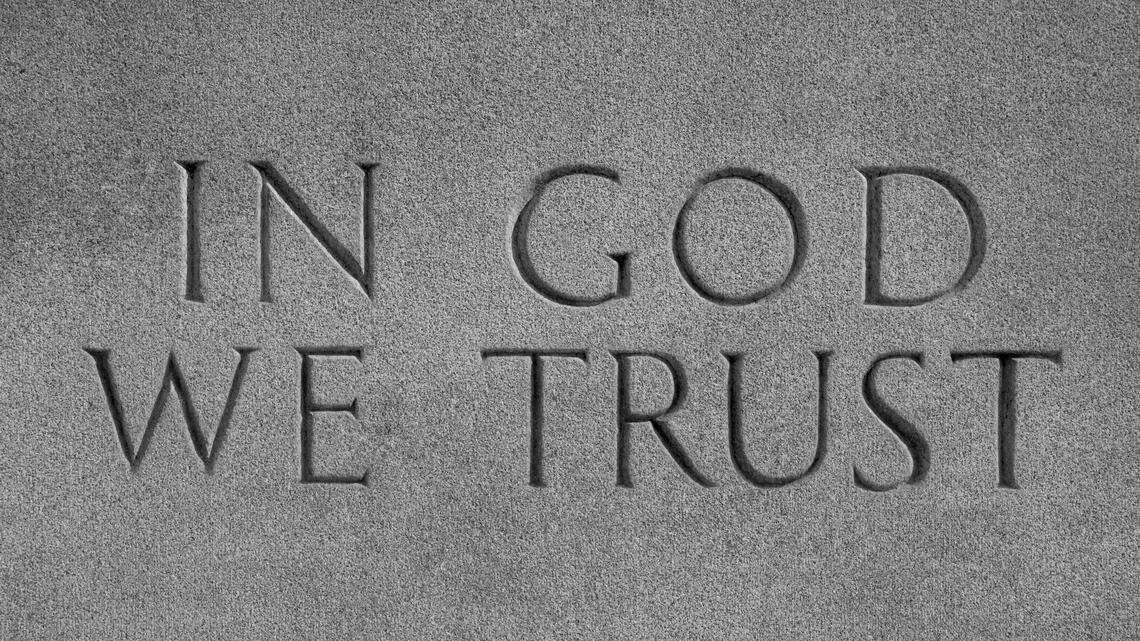 “In God We Trust,” carved in stone.