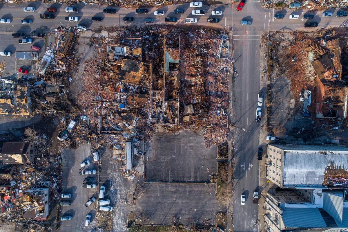 Buildings are demolished in downtown Mayfield, Ky., on Saturday, Dec. 11, 2021, after a tornado traveled through the region the night before.