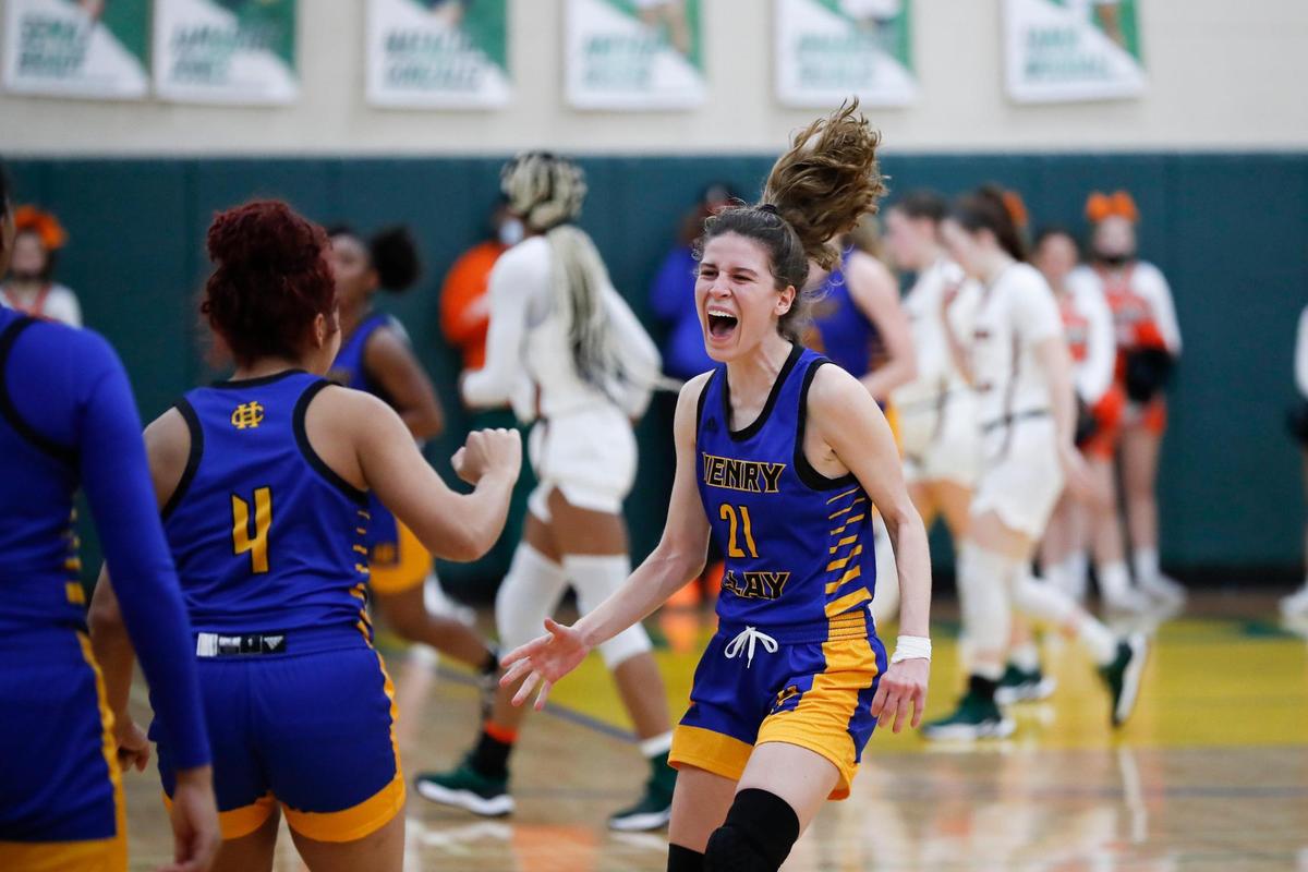 Henry Clay’s Lydia Van Metre (21) celebrates after defeating Frederick Douglass in the 42nd District Tournament semifinals.