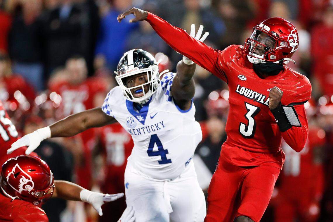 Louisville quarterback Malik Cunningham (3) threw for 145 yards with an interception and ran for 35 yards and a touchdown in U of L’s 52-21 loss to Kentucky last season at Cardinal Stadium.