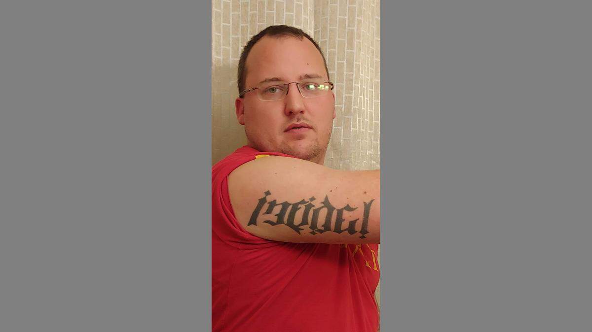 Shaun DeWaters, of Boone County, was ordered to turn in his “INFDL” license plate. He has the word “infidel” tattooed on his arm.