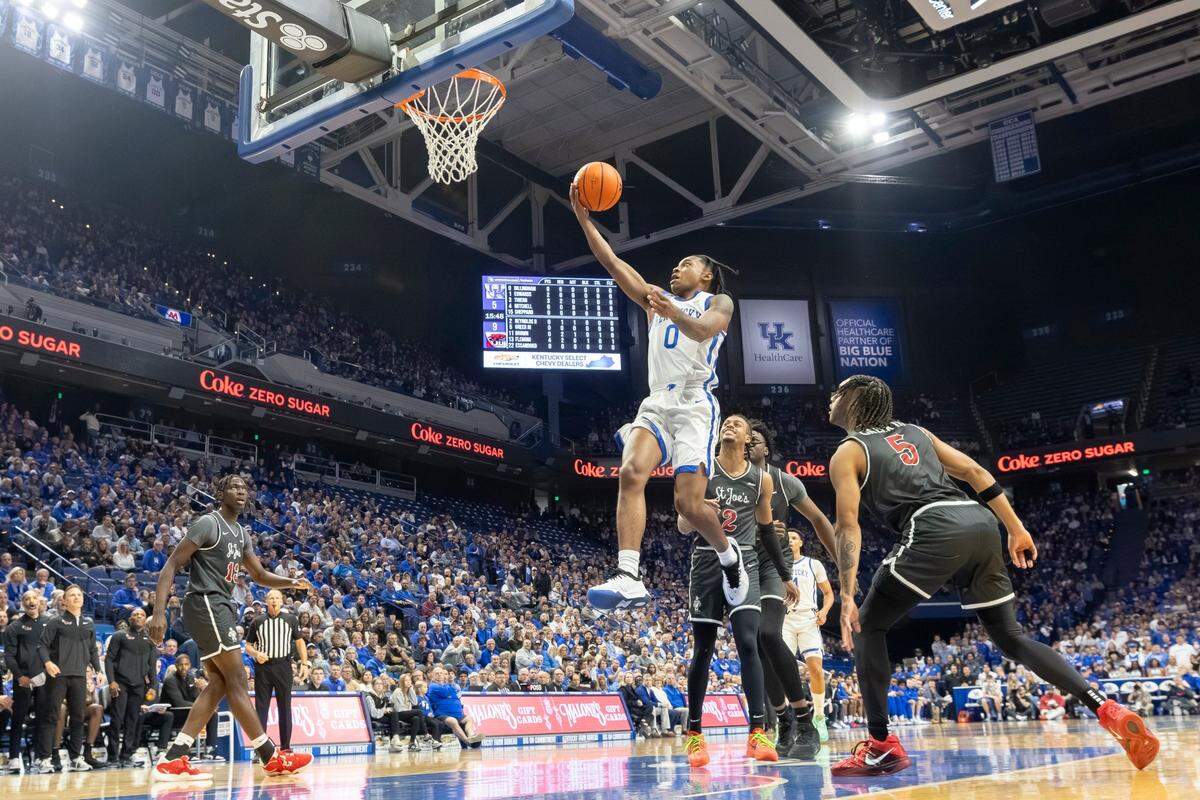 Kentucky freshman Rob Dillingham (0) is averaging 16.0 points per game, second on the team behind Antonio Reeves’ 18.2.