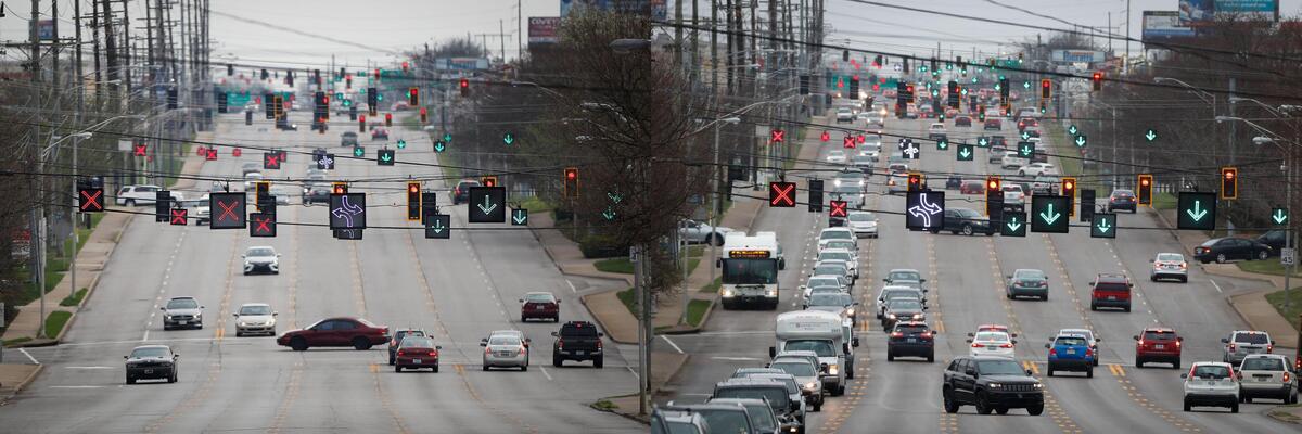 A composite image showing traffic along Nicholasville Road near Southland Drive in Lexington. At left, motorists travel along at 3:47 p.m. Saturday, March 28, 2020. At right, is Nicholasville Road at 4:24 p.m. Wednesday, March 17, 2021.