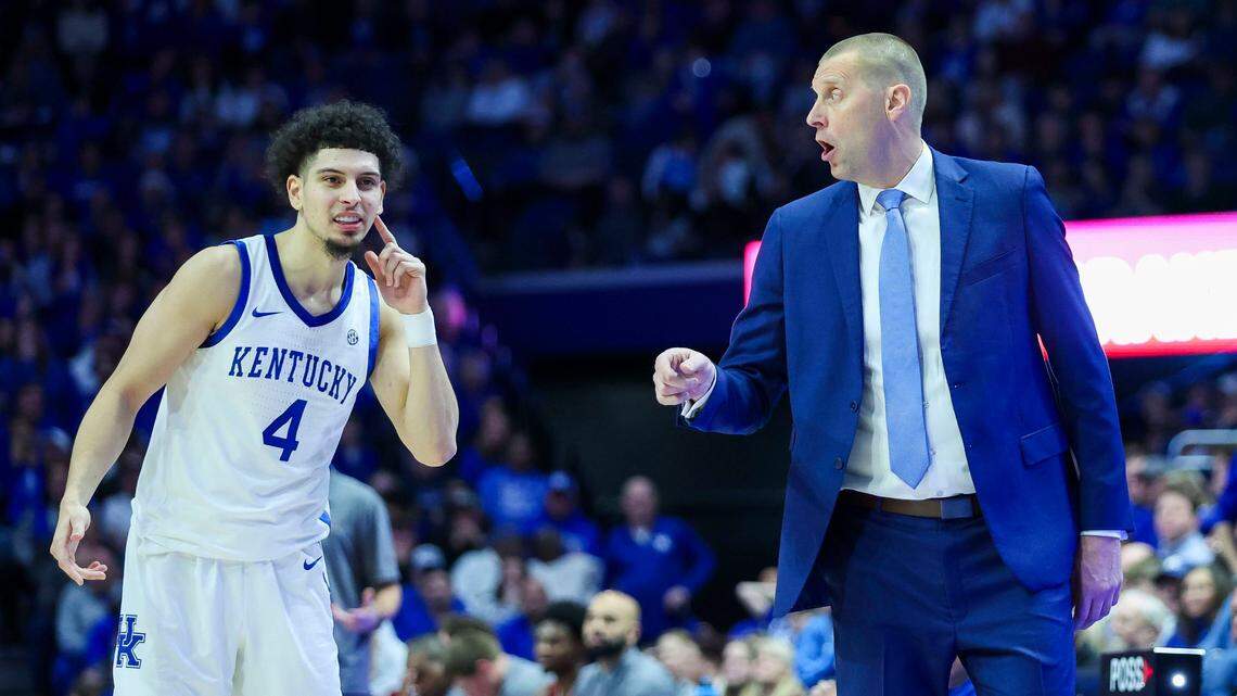 Kentucky head coach Mark Pope, right, shouts instructions to guard Koby Brea (4) during Wednesday’s game against Colgate.