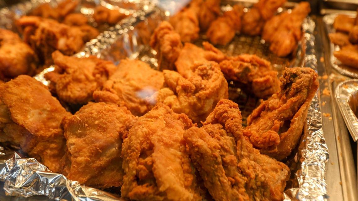 Fried chicken behind glass served at Joe’s Mini Food Mart on East Loudon avenue, Feb. 12, 2021.