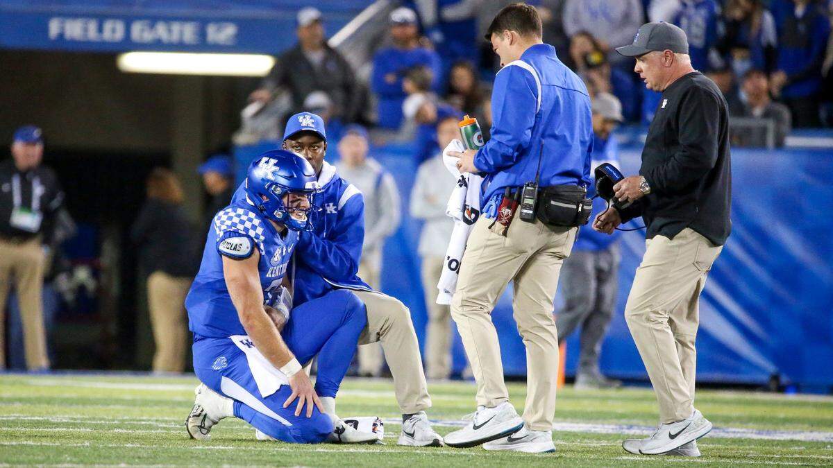 Kentucky quarterback Will Levis, left, was injured during the second half against Mississippi State. However, he returned to help lead the Wildcats to a 27-17 victory.