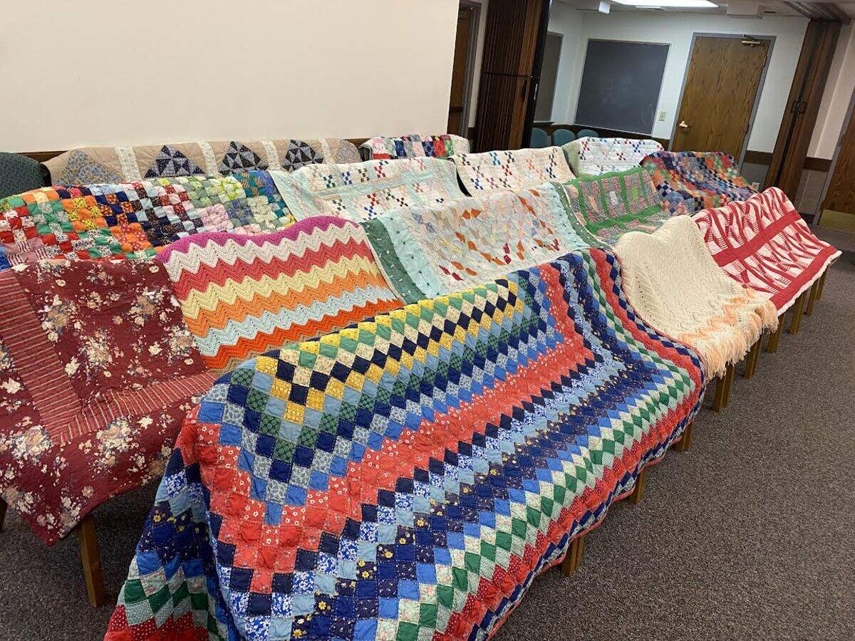 These quilts were recovered from the home of Gilla Miller who died in the July floods in Breathitt County, Kentucky. Volunteers restored them.