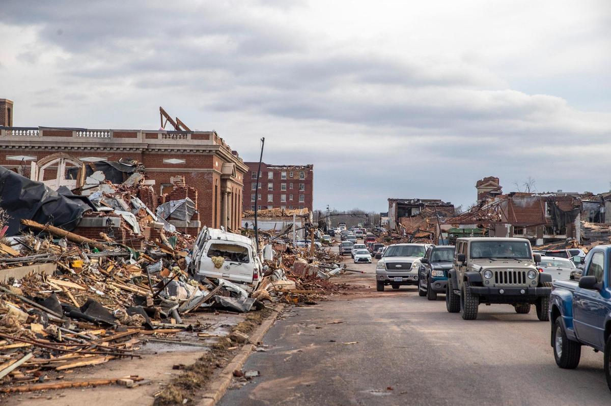 Buildings are demolished in downtown Mayfield, Ky., on Saturday, Dec. 11, 2021, after a tornado traveled through the region Friday night.